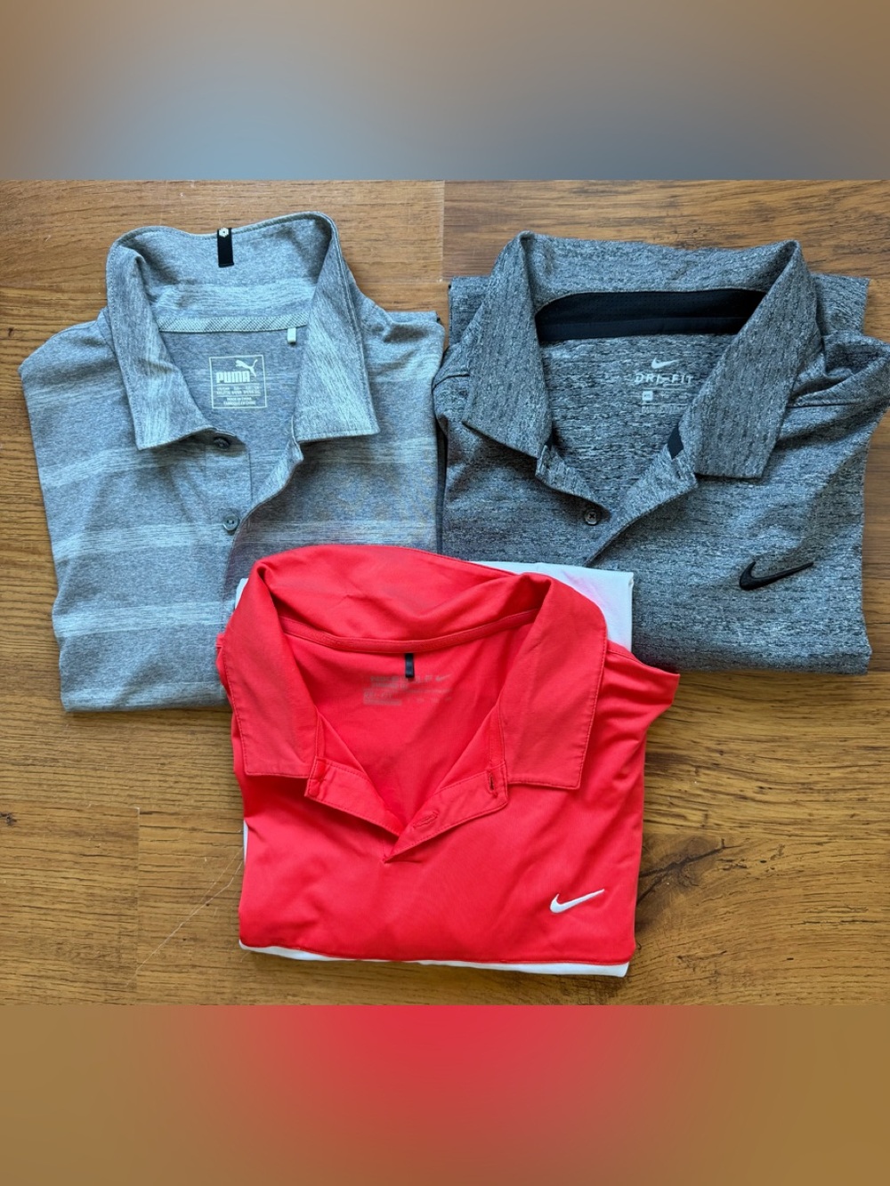 One Nike Men’s Bright Red, One Grey Nike and One Puma Golf shirt XXL